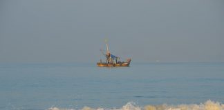 Fishermen sailing out to seas early morning at Utorda beach