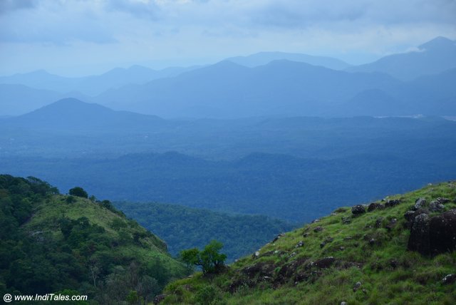 Layers of mountains view from the Ponmudi Hill Station