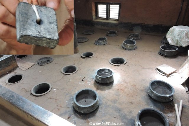 The piece of Indigo Dye and the floor with pots to Dye