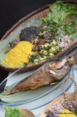 Traditional smoked-fish preparation at Indigenous Terra Madre