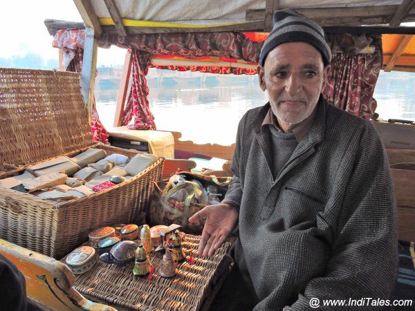 Salesman on a Shikara on Nagin Lake, Srinagar