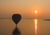 Sunrise scene with a Hot Air Balloon over Krishna river at Amaravati