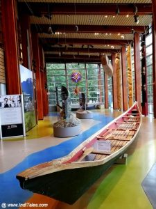Long narrow canoe carved out of a single log of red cedar wood at Squamish & Lil'wat Centre